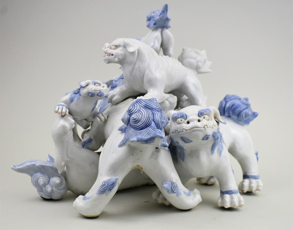 Appraisal: BLUE AND WHITE PORCELAIN GROUP OF FU-DOGSJapanese Chinese th Century