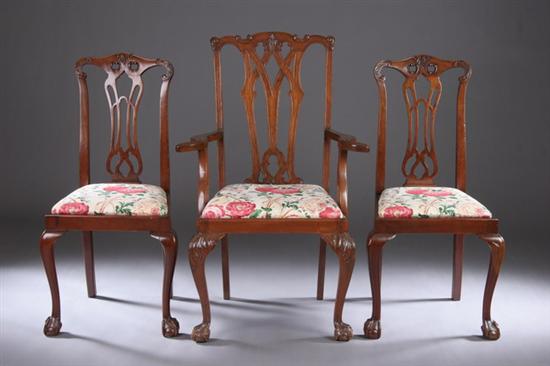 Appraisal: SET SIX CHIPPENDALE-STYLE DINING CHAIRS th century Each scrolling-foliate carved