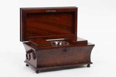 Appraisal: A William IV mahogany sarcophagus-shaped tea caddy on bun feet