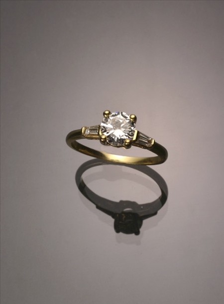 Appraisal: -Karat Yellow-Gold Solitaire Diamond Ring The four-prong A-box mount set