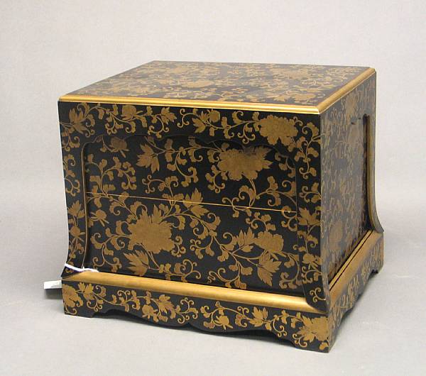 Appraisal: A black and gilt lacquer three-piece box set Including a