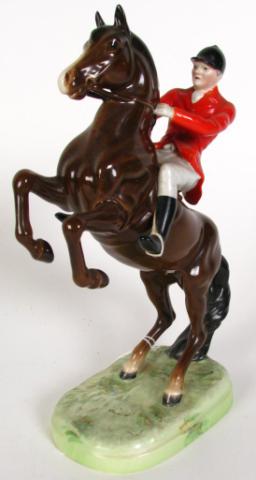 Appraisal: A Beswick English Porcelain figure Fox Hunter on horseback inches