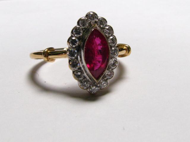 Appraisal: K yellow gold ring with ct marquis cut ruby and