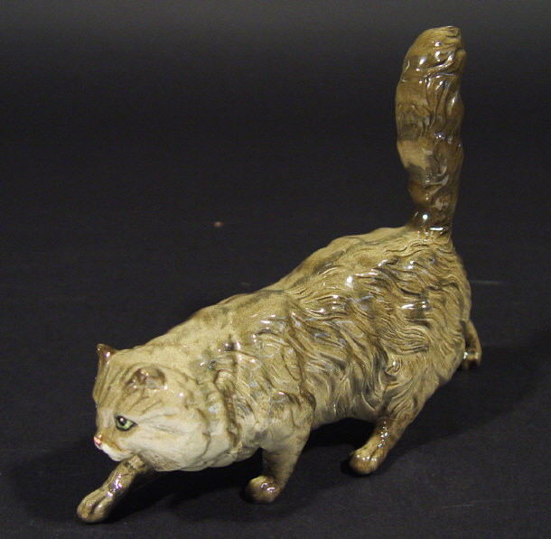 Appraisal: Royal Doulton pouncing cat hand painted in brown printed factory