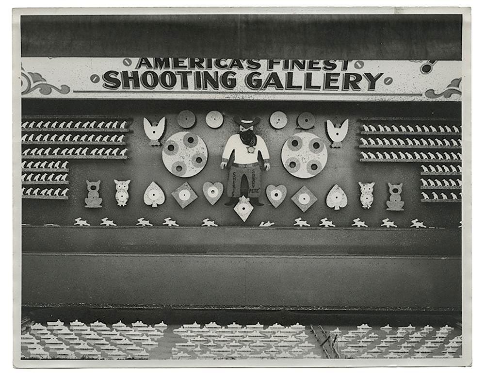 Appraisal: Vintage Sneaky Pete Shooting Gallery Photograph Carnival Vintage Sneaky Pete