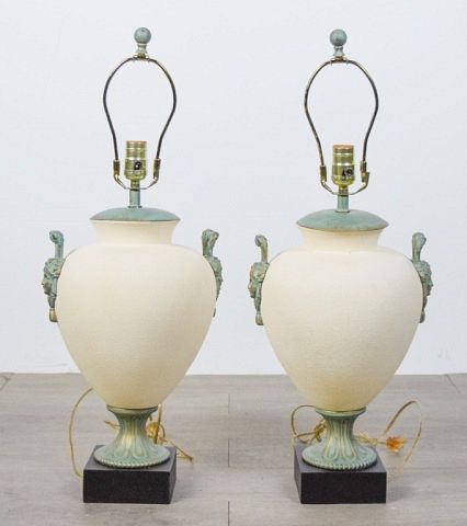 Appraisal: Pair of Ceramic Lamps With brass fittings and figural handles