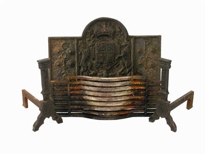 Appraisal: A cast iron arched fireback centred the Royal coat of