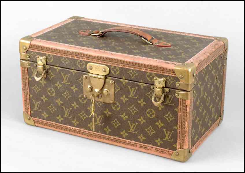 Appraisal: LOUIS VUITTON MONOGRAMMED CANVAS AND LEATHER COSMETICS CASE With two