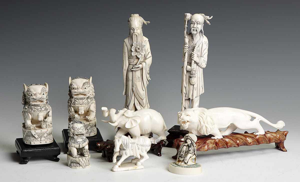 Appraisal: Group of Carved Ivory Figures Animals th cent Buddhst lion