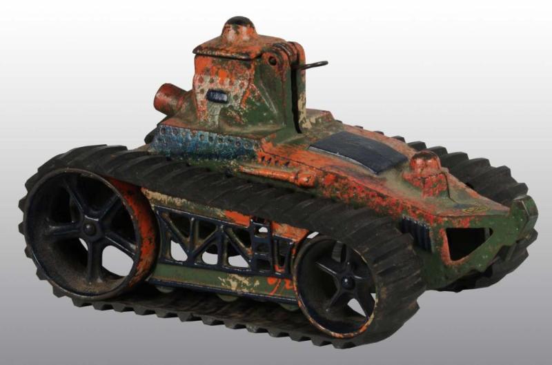 Appraisal: Cast Iron Arcade Camouflage Tank Toy Description Includes Arcade sticker