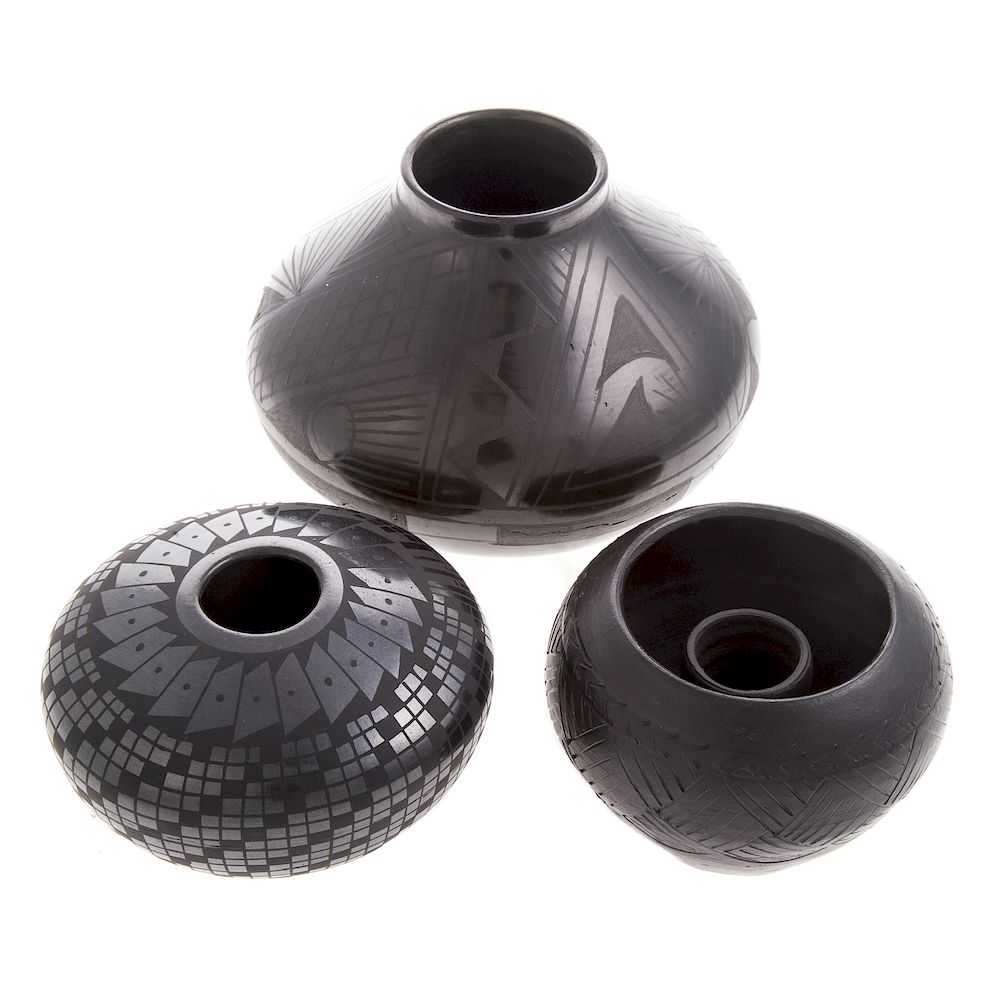 Appraisal: Three Native American blackware pottery articles including ovoid candleholder by