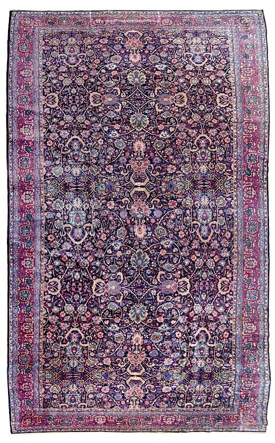 Appraisal: A Kirman Wool Rug feet inches x feet inches A