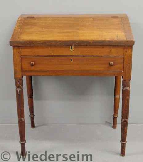 Appraisal: Sheraton walnut schoolmaster's desk c with a lift lid opening