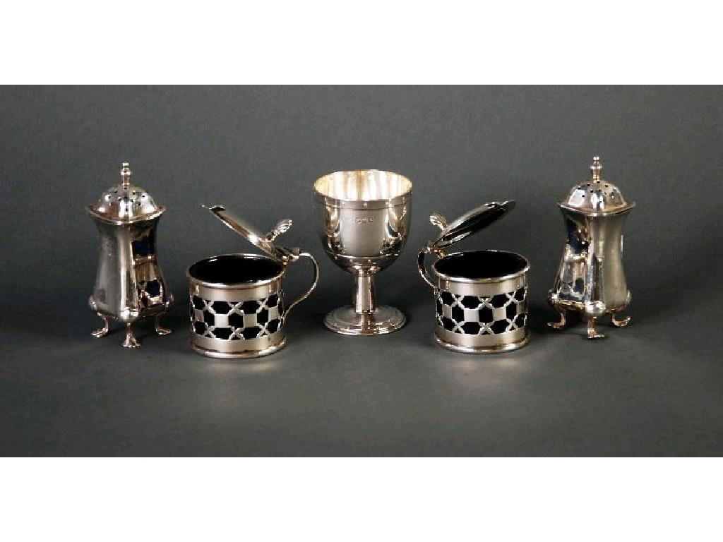 Appraisal: FOUR GEORGE V SILVER CONDIMENTS comprising PAIR OF PIERCED DRUM