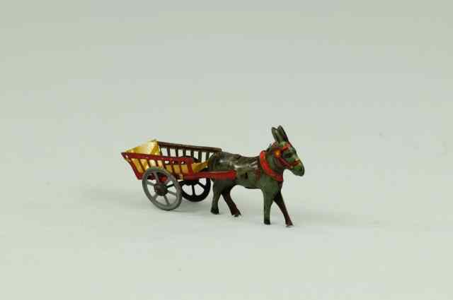 Appraisal: DONKEY DRAWN PENNY TOY Germany lithographed tin includes donkey cart