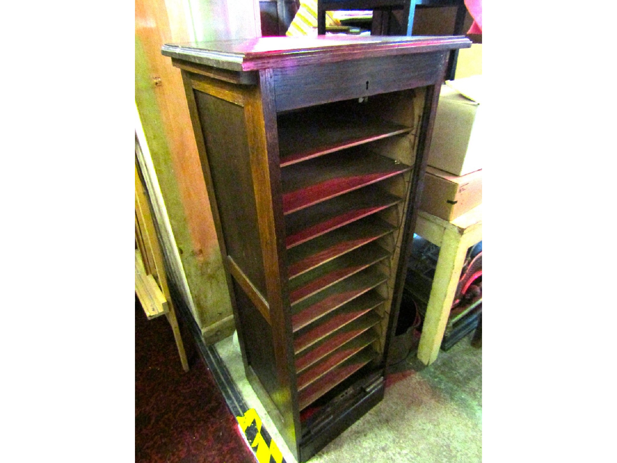 Appraisal: An early th century oak floorstanding filing cabinet with rise