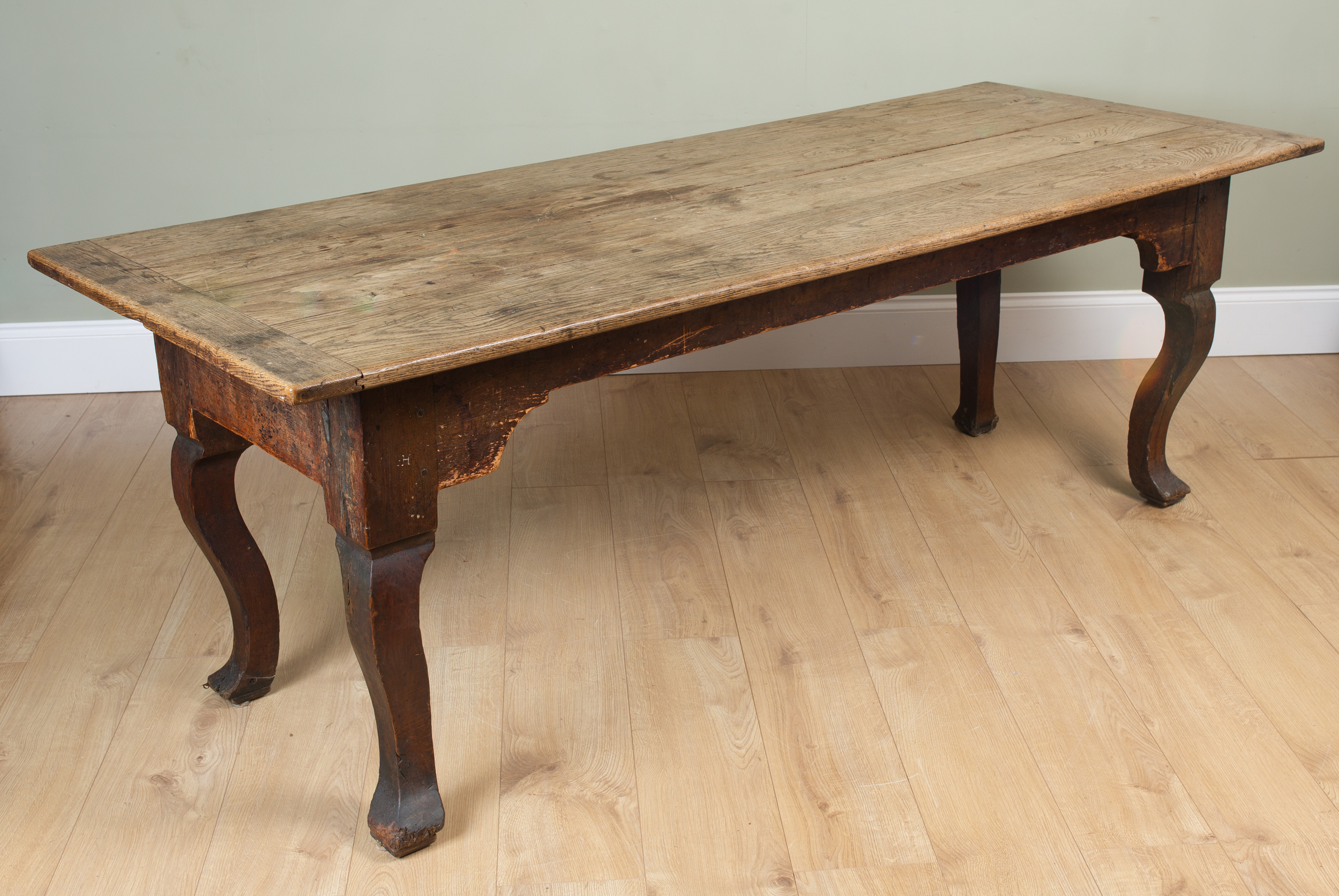 Appraisal: A th century oak rectangular kitchen table the plank top