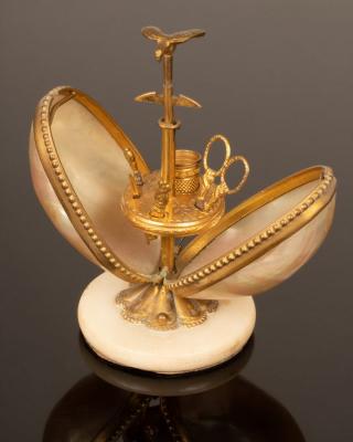 Appraisal: A late th Century mother-of-pearl egg-shaped etui with gilt metal