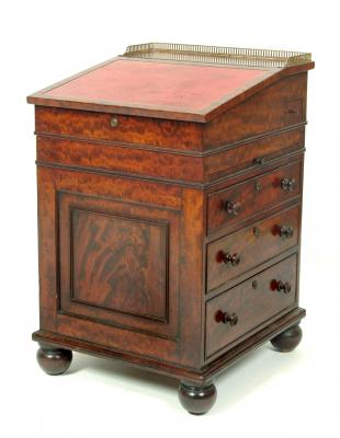 Appraisal: AN EARLY VICTORIAN MAHOGANY DAVENPORT the sliding top with pierced