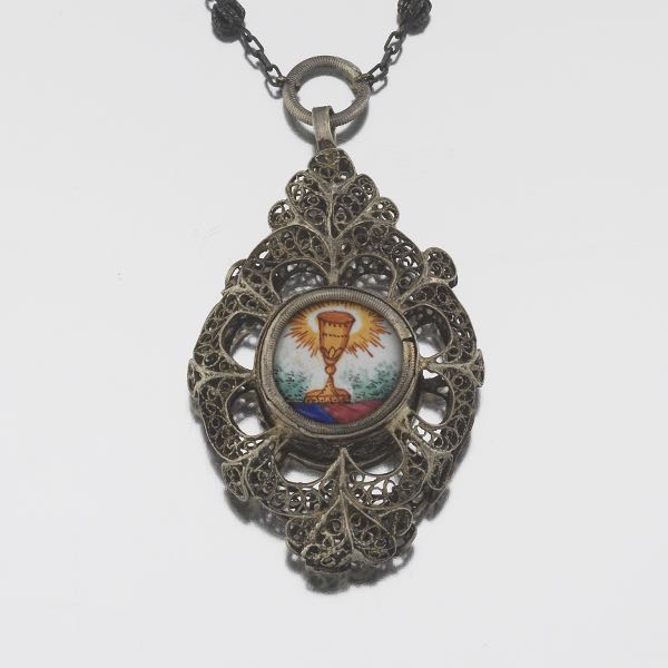 Appraisal: AUSTRO-HUNGARIAN SILVER AND ENAMEL HOLY RELIC PENDANT ON SILVER CHAIN