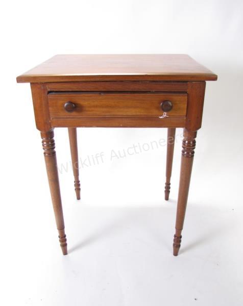 Appraisal: An antique walnut table with one drawer having hand-chamfered drawer