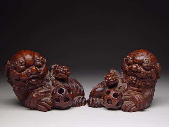 Appraisal: PAIR CARVED BAMBOO LIONS Pair of well carved and featured