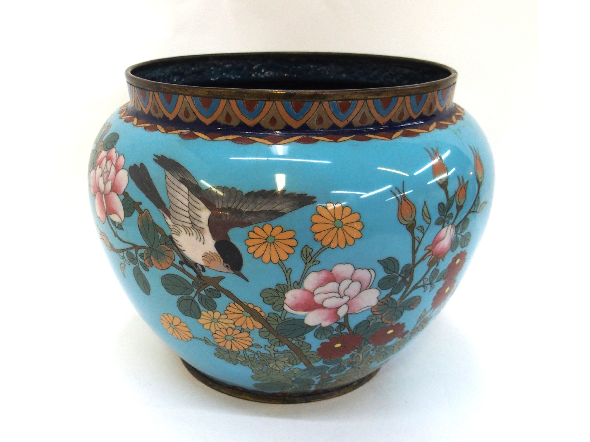 Appraisal: Cloisonne jardiniere decorated with flowers and birds