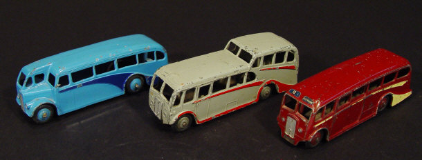 Appraisal: Three Dinky Toys die-cast coaches comprising a luxury coach observation