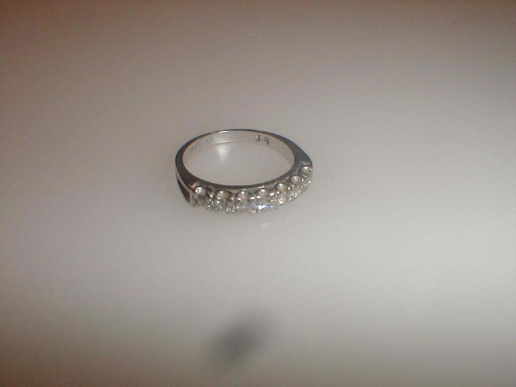 Appraisal: A diamond set half hoop eternity ring set with seven