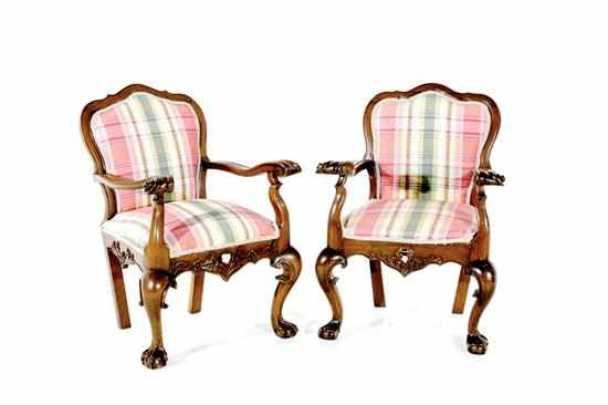 Appraisal: Pair Continental Chippendale walnut open armchairs late th century molded