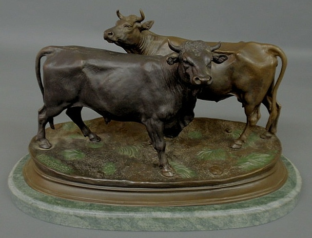 Appraisal: French bronze of a bull and cow signed after J