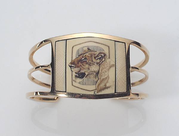 Appraisal: A scrimshaw ivory and k gold cuff bracelet of tiger