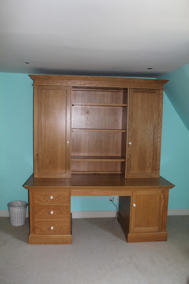 Appraisal: A modern cabinet made work station with drawers refrigerator keyboard