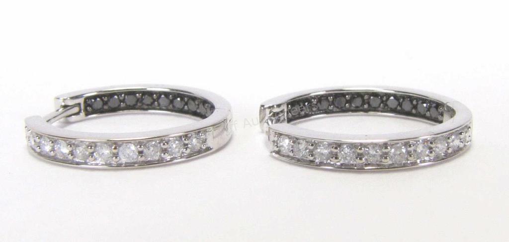 Appraisal: A pair of K white gold inside out hoop earrings