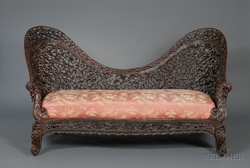 Appraisal: Burmese Carved and Reticulated Hardwood Sofa with Upholstered Cushion Seat