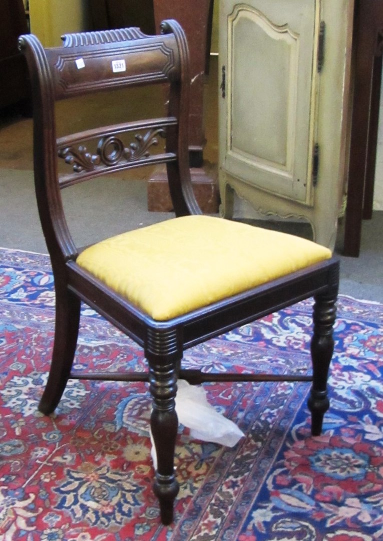 Appraisal: A set of four George IV mahogany dining chairs with