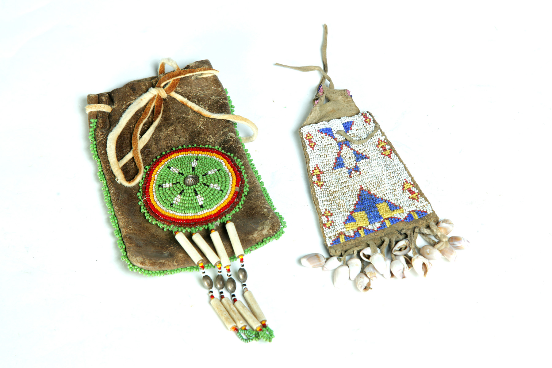 Appraisal: TWO AMERICAN INDIAN BEADED POUCHES Early th century leather One