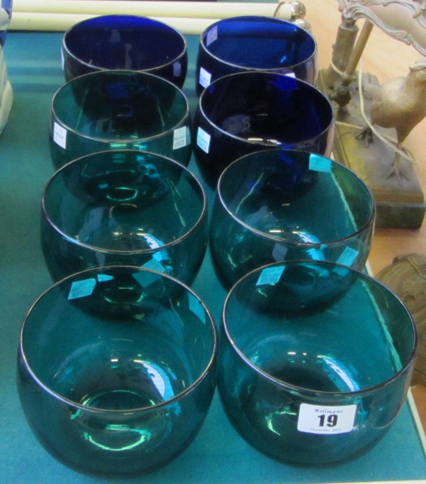 Appraisal: A group of five green glass rinsers and three blue