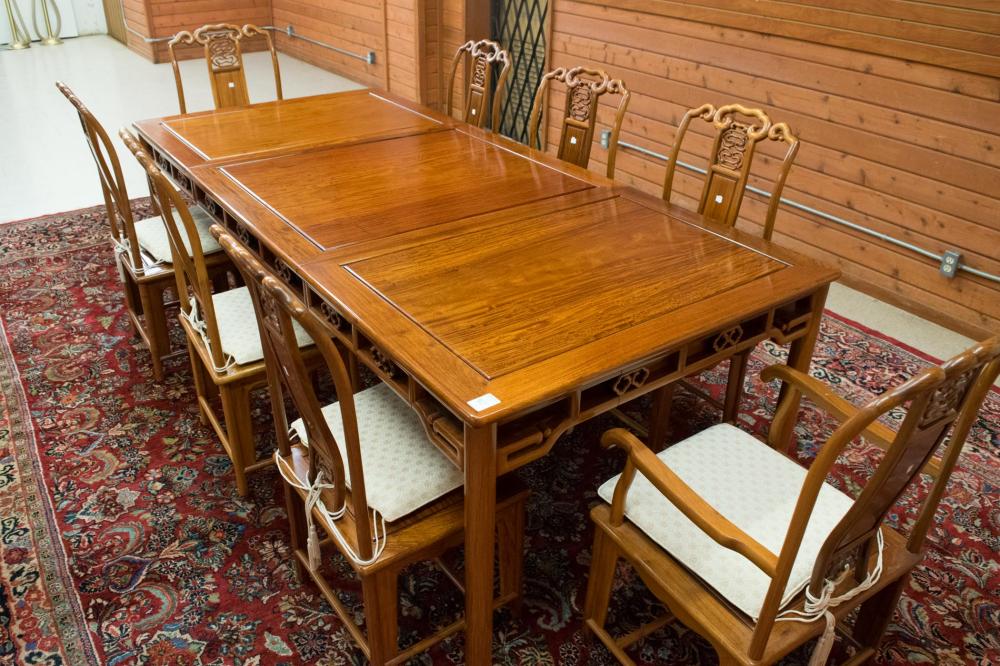 Appraisal: CHINESE ROSEWOOD DINING TABLE AND EIGHT CHAIRS SET The rectangular