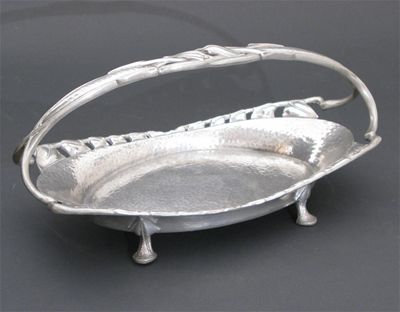 Appraisal: A Liberty Co pewter tray elliptical form with pierced cast