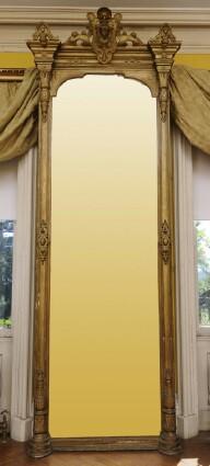 Appraisal: RENAISSANCE REVIVAL GILTWOOD PIER MIRROR The crest with shield-shaped cartouche