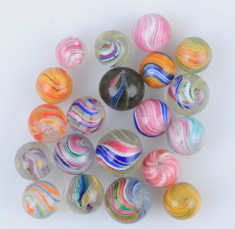 Appraisal: Lot Of Handmade Marbles Lot has multicolor onionskins and swirls