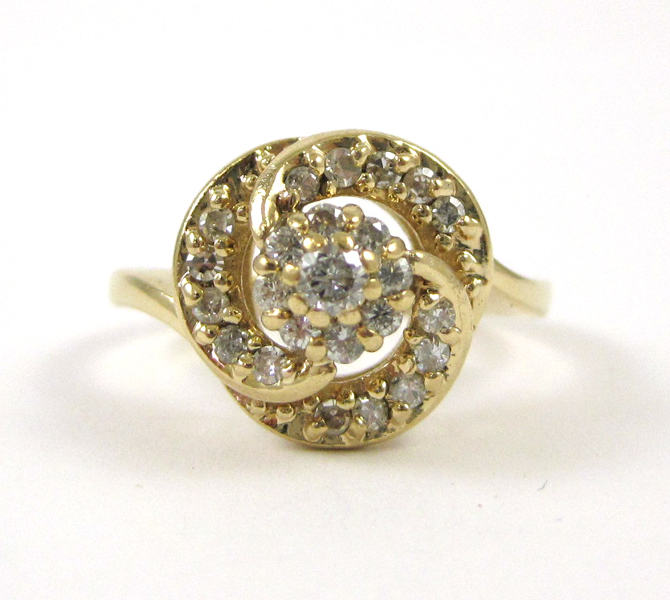 Appraisal: DIAMOND AND FOURTEEN KARAT GOLD RING set with round-cut diamonds