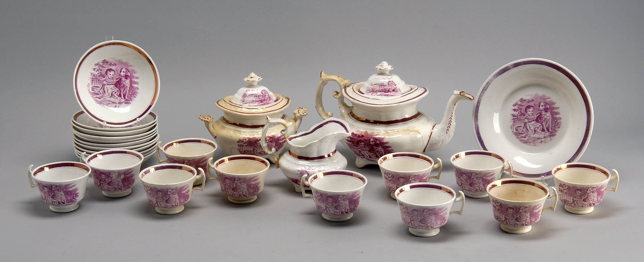 Appraisal: COPPER LUSTRE TEA SET FOR ELEVEN with pink and white