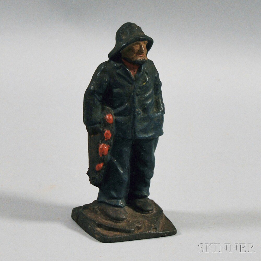 Appraisal: Polychrome Painted Iron Fisherman Figure th century ht in Estimate