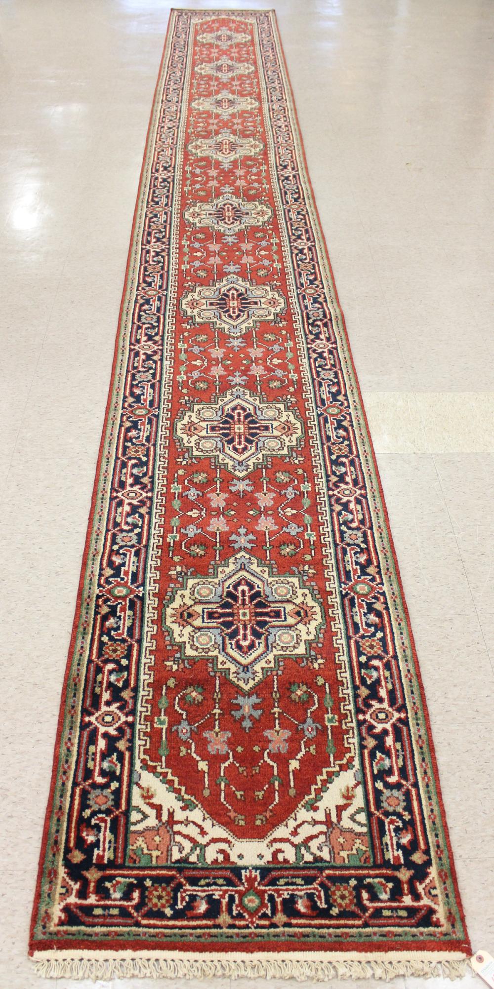 Appraisal: HAND KNOTTED ORIENTAL CORRIDOR CARPET Persian Serab design featuring eight