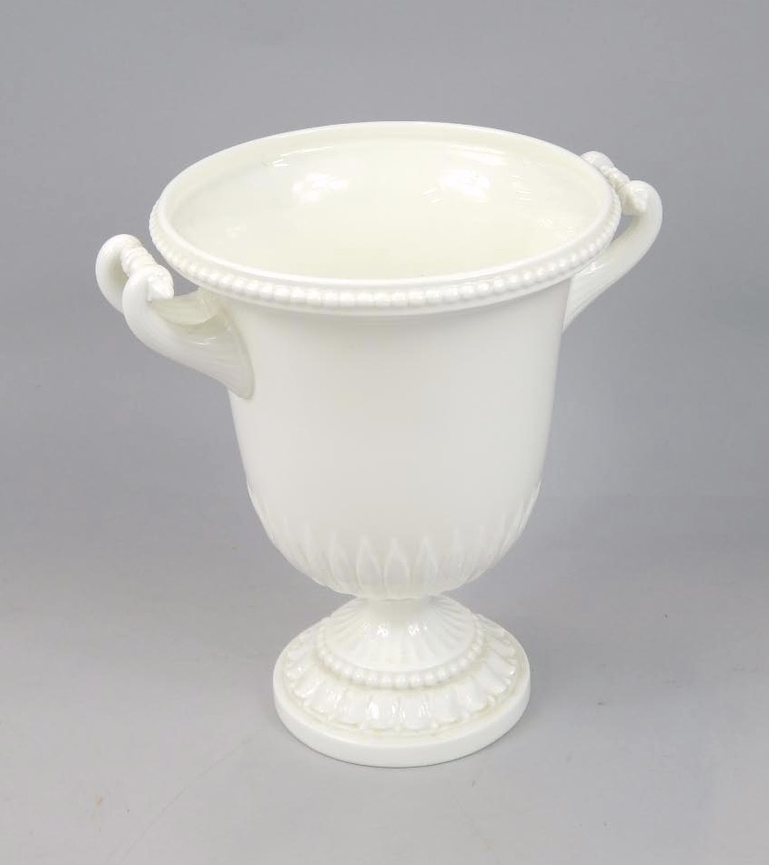 Appraisal: A Royal Worcester two handled urn with white glaze cast