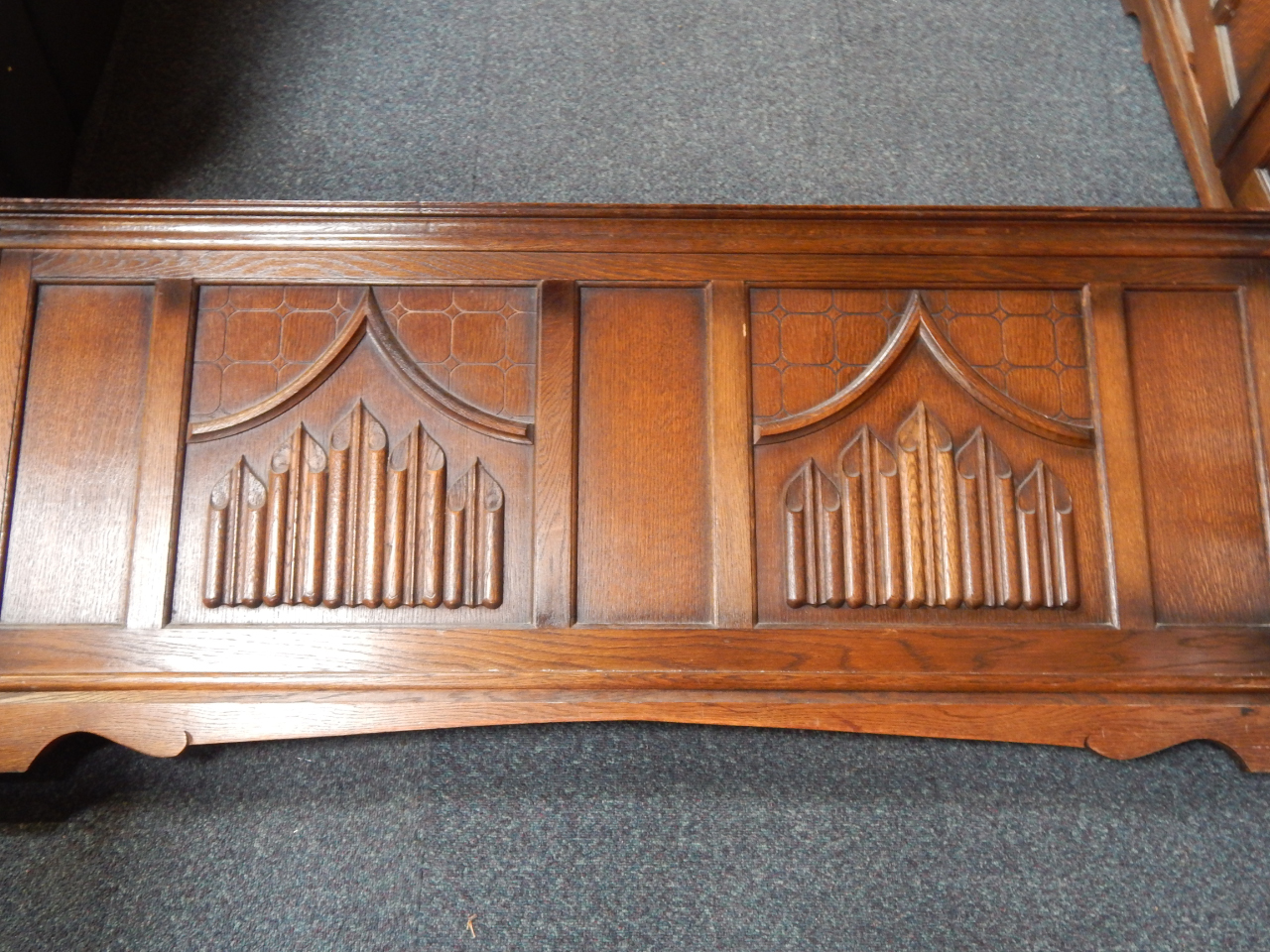 Appraisal: An Old Charm oak double bed with linenfold panelled head