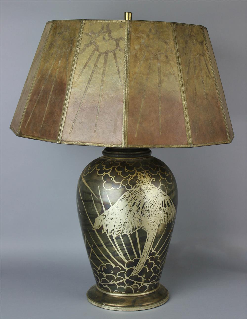 Appraisal: ART DECO PATINATED METAL TABLE LAMP WITH MICA SHADE SIGNED