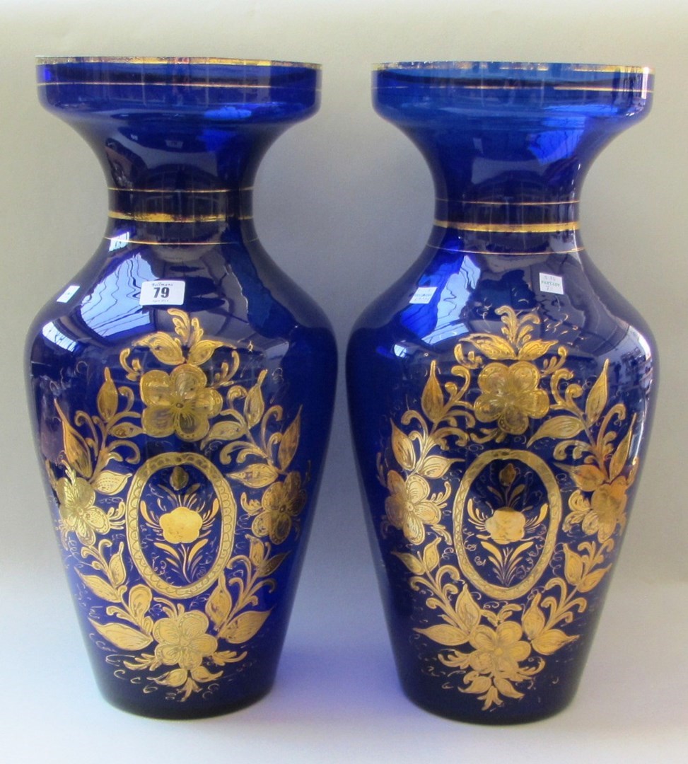 Appraisal: A pair of large blue glass vases modern gilt decorated